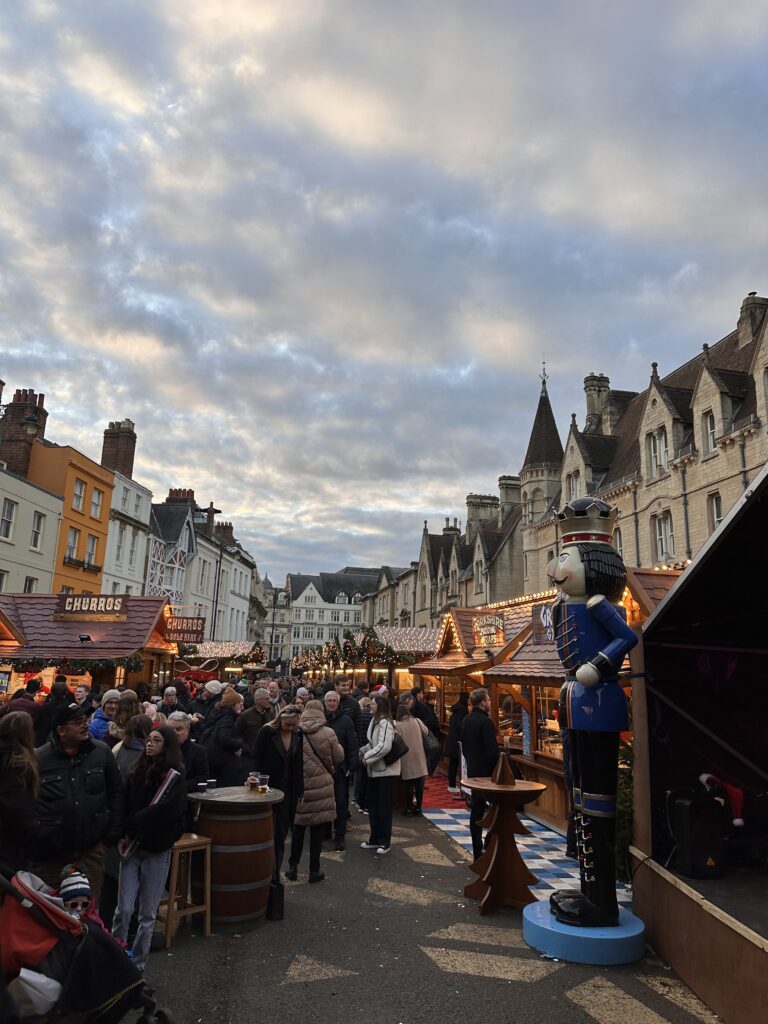 A crowded christmas market setting